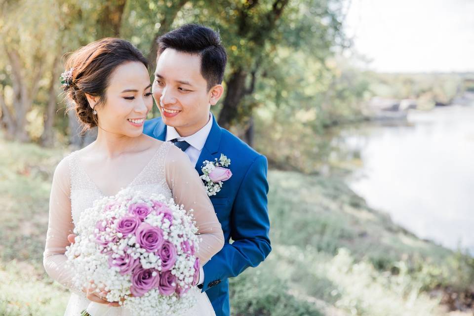 Happy couple by the water