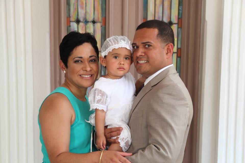 Happy couple with their beautiful baby at one of our Historic churches