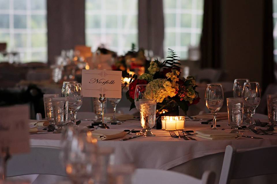 Candlelit reception setup and table decor