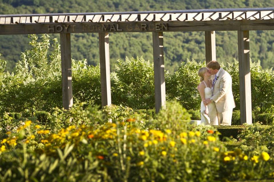 Groom kissing his bride