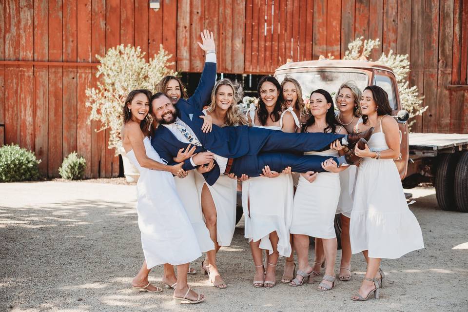 Groom with bridesmaids