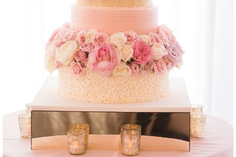 Pink flowers on the cake
