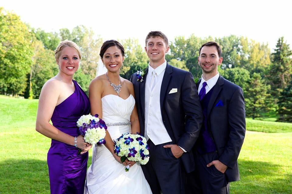 Couple with their bridal attendants