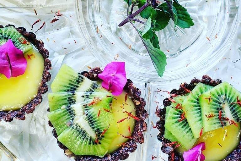 Kiwi mini tarts with lemon filling and raw + gluten free cacao crust