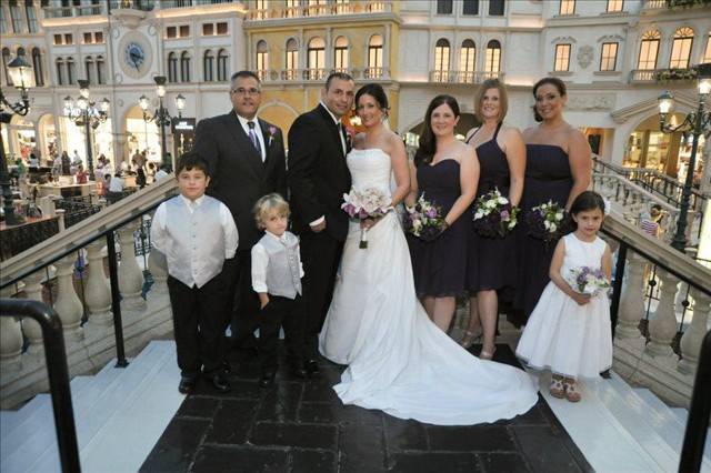 The couple with the bridesmaids and groomsmen