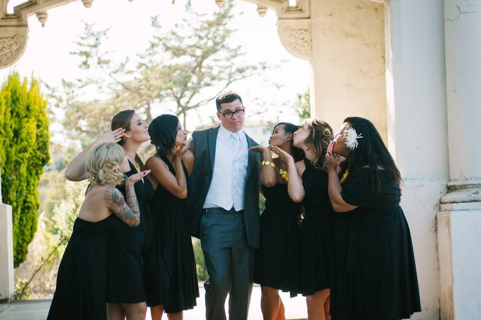 Groom along with bridesmaids