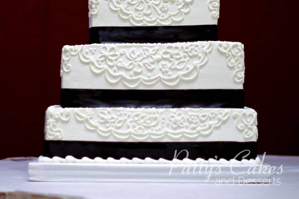 Wedding cake with black flowers