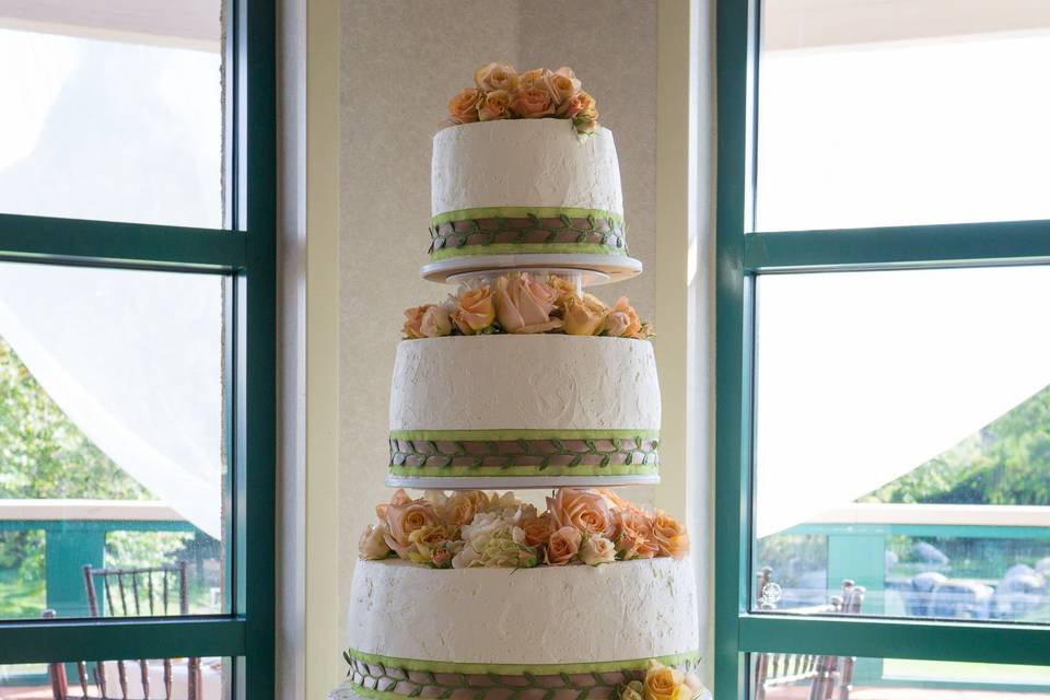 Tall wedding cake with flowers