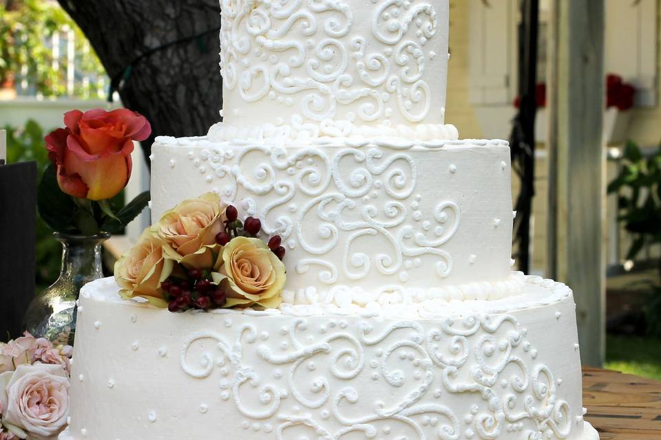 Wedding cake with minimal flowers