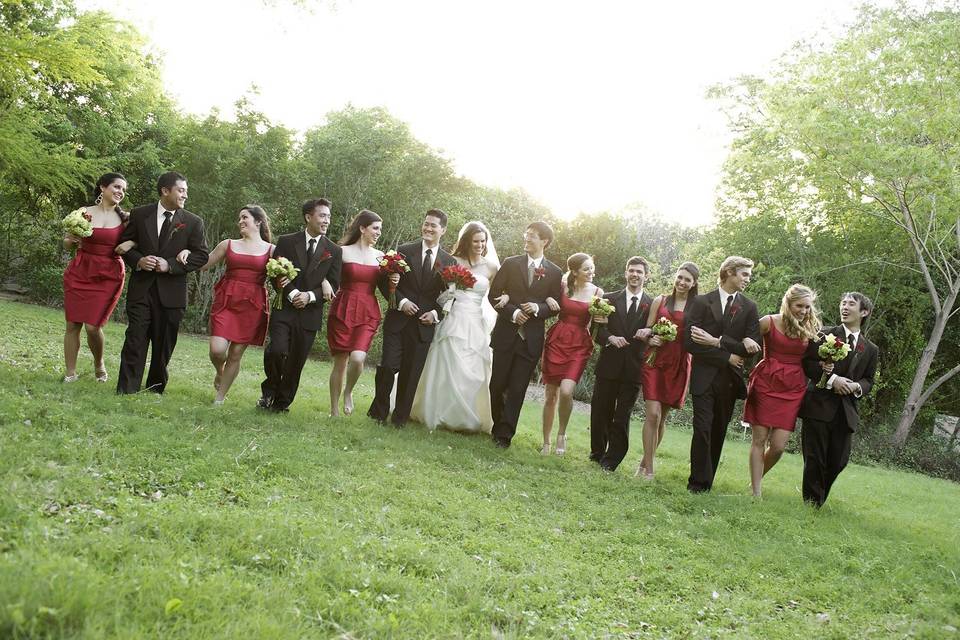 The couple with the bridesmaids and groomsmen