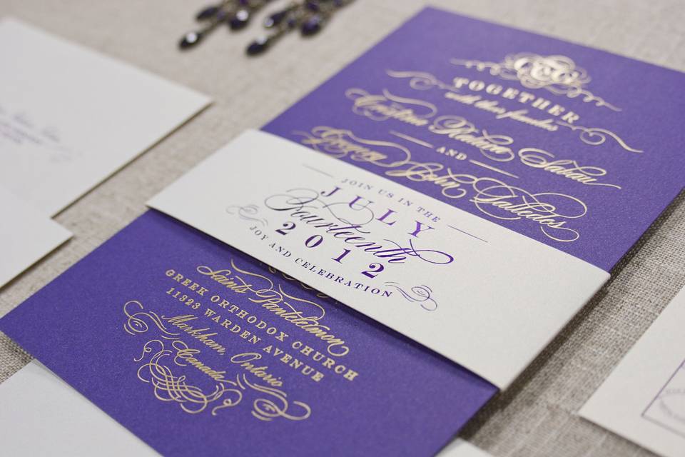 Iconic Love Collection: Cristina
Gold foil stamped invitation printed on shimmery violet hued cover stock. Custom contrasting colored belly band wrap.