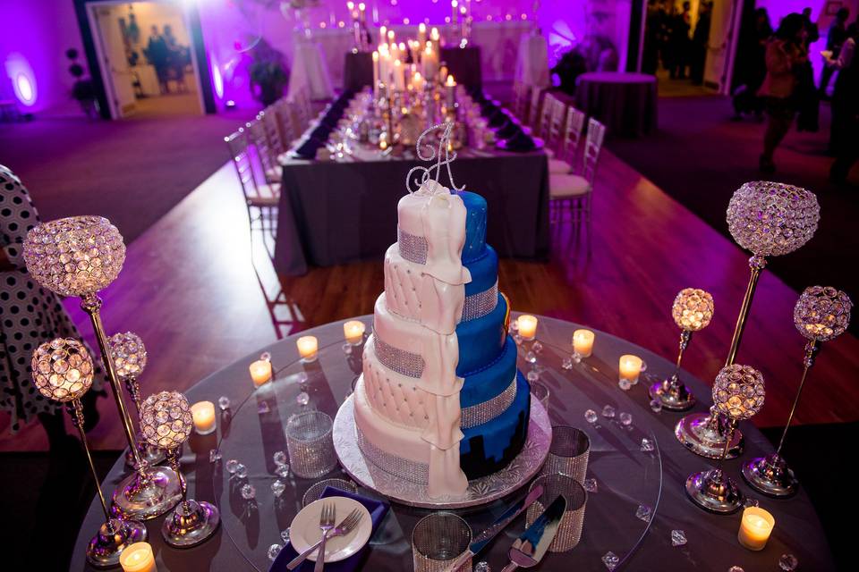 White and blue halved wedding cake