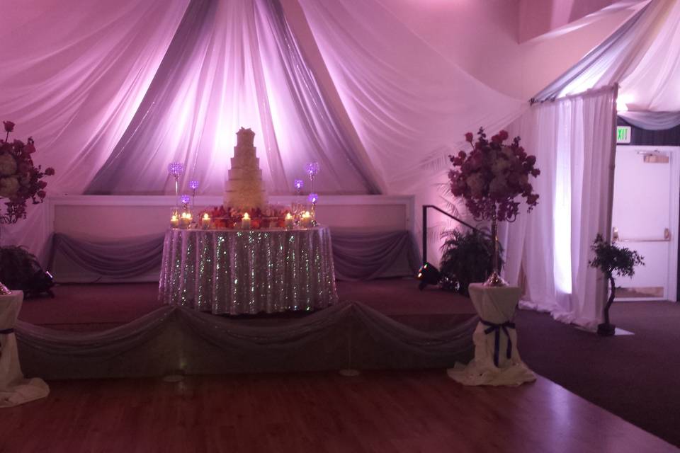 Wedding cake with backdrop drapes