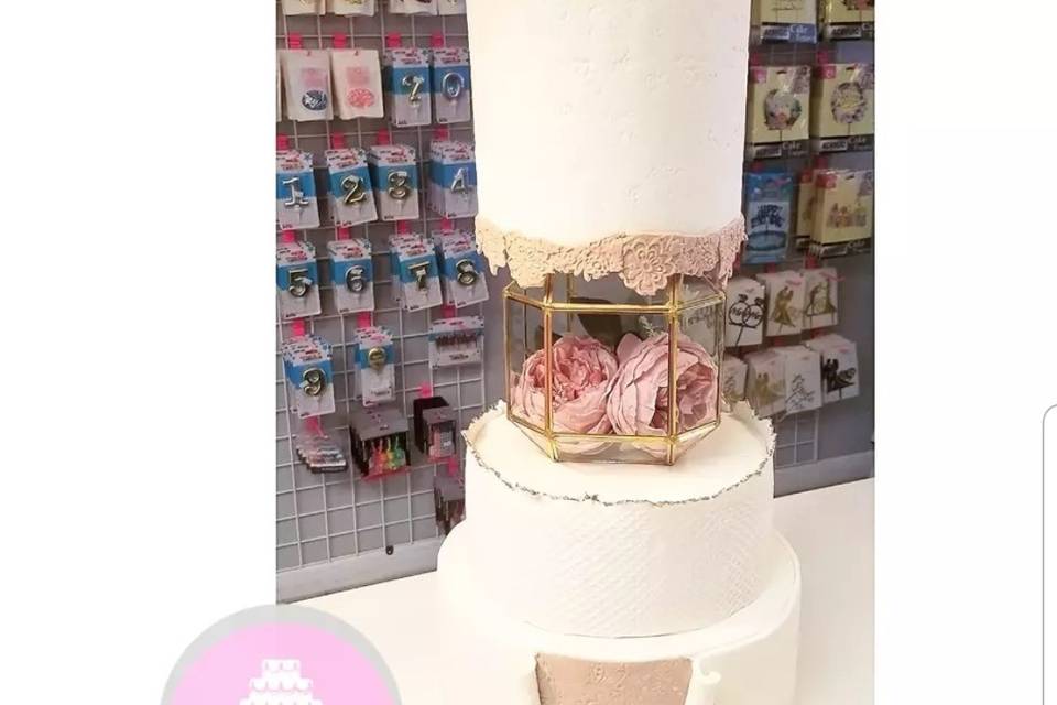 Tan and pink wedding cake