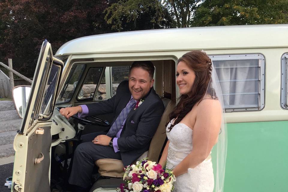 Chloe the VW PhotoBus with a bride and groom at their wedding at Mt. Hope Farm in Bristol, Rhode Island.