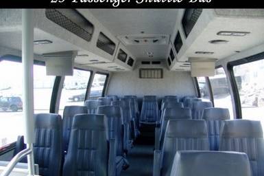23 Passenger shuttle bus with leather captain chair seating, 3 TV'S. Great for transporting guests of the wedding, corporate transfers or pickups from the airport. Large luggage storage in rear.