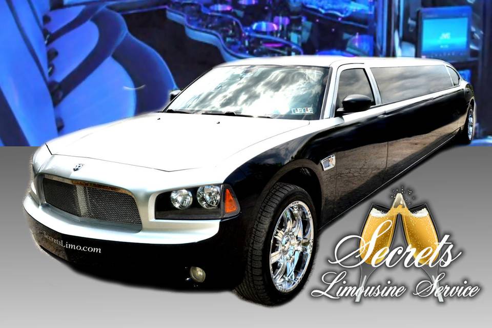 BLACK AND SILVER 10 PASSENGER STRETCH ASANTI LIMO WITH 2-LCD TVs, PREMIUM DVD/AM/FM/CD WITH SURROUND SOUND FIBER OPTIC MIRRORED CEILING AND BAR, DIMMER CONTROLLED LIGHTS AND HANDS FREE INTERCOM.