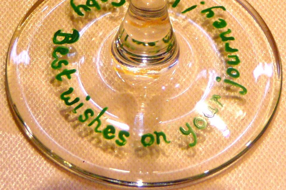 Example of special message to the newlyweds on the bottom of a wine glass.