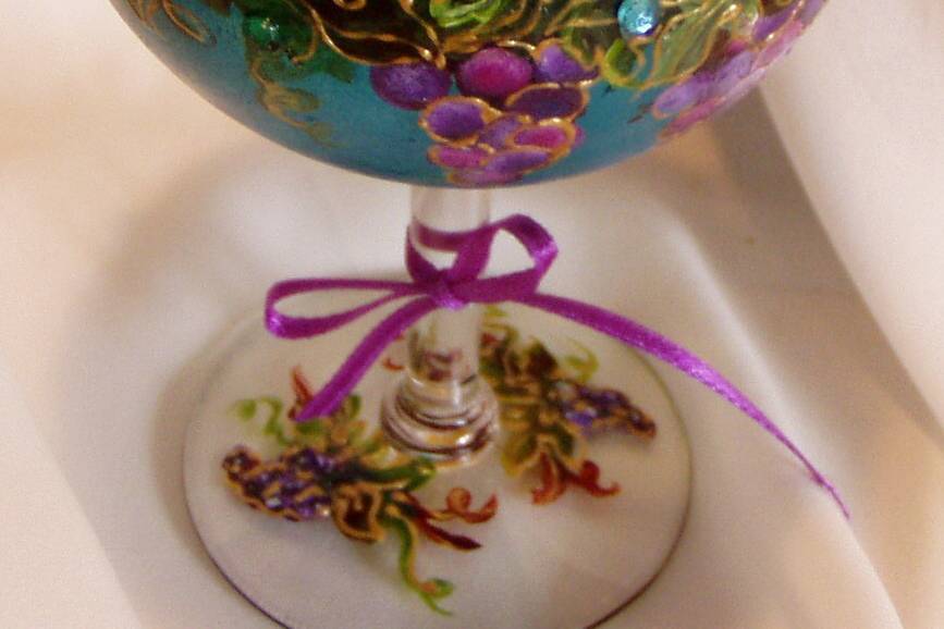 Victorian / Gothic style goblet wine glass with grapevine design with gems of blue, purple and green. Can be personalized on base of glass.