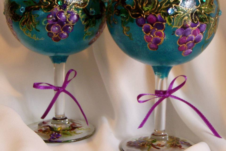 Victorian / Gothic style goblet wine glass with grapevine design with gems of blue, purple and green. Can be personalized on base of glass.
