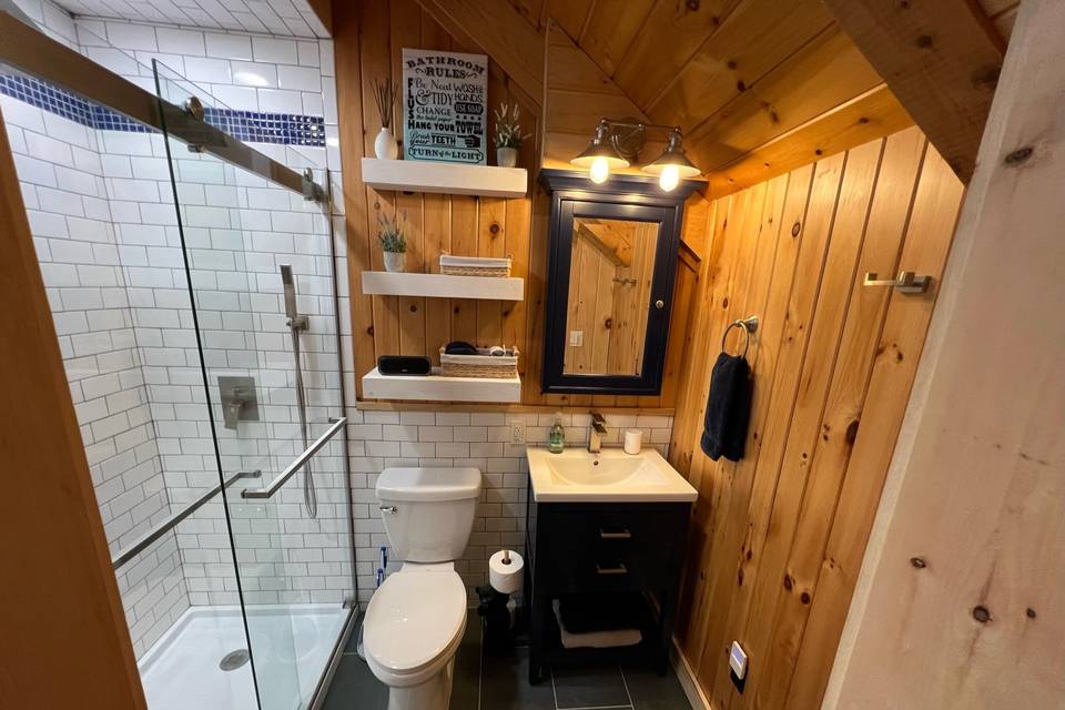 En-suite bath with shower