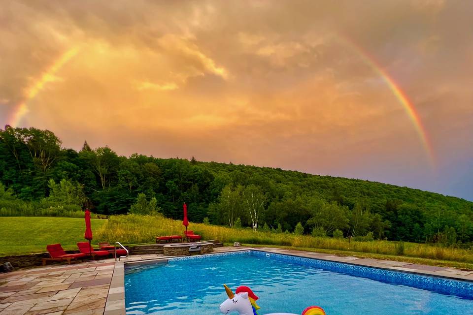 Pool with rainbow and unicors