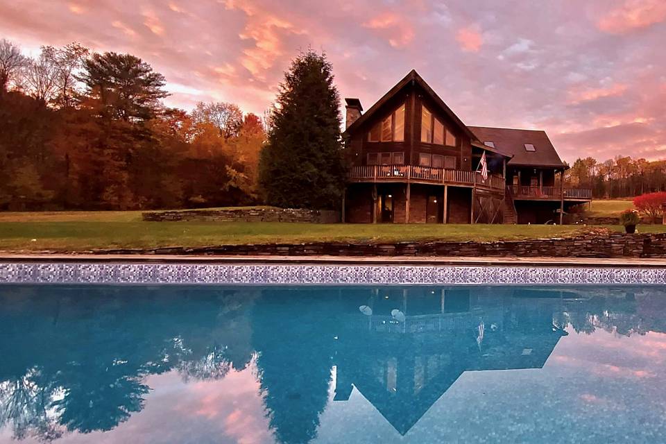Pool and chalet log home