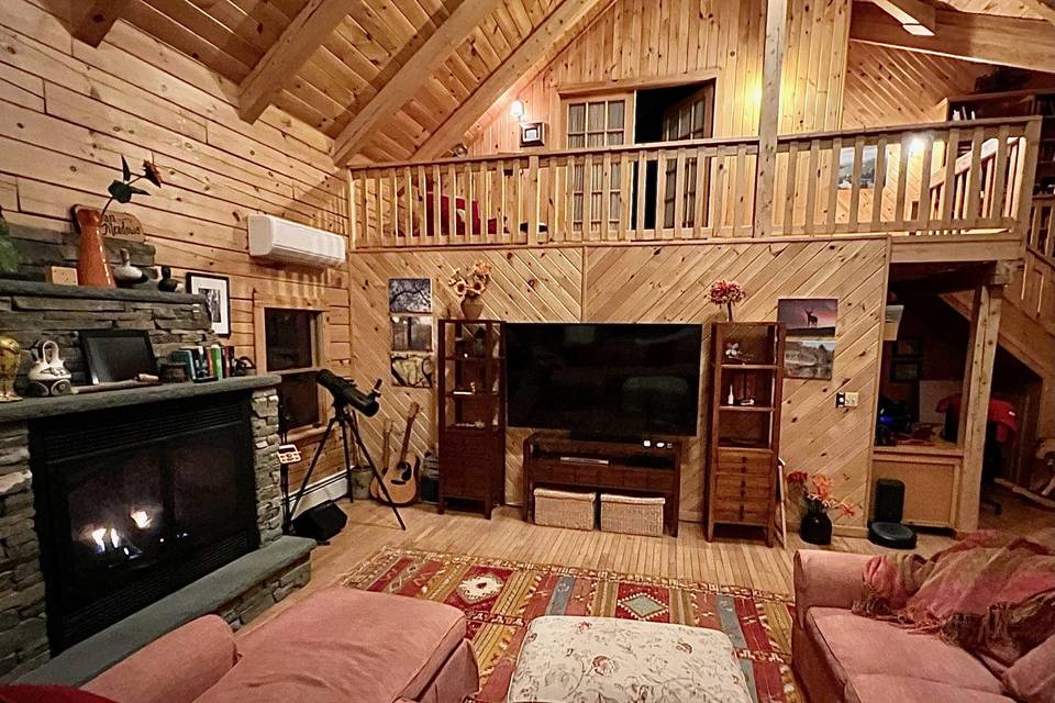 Log home living room fireplace