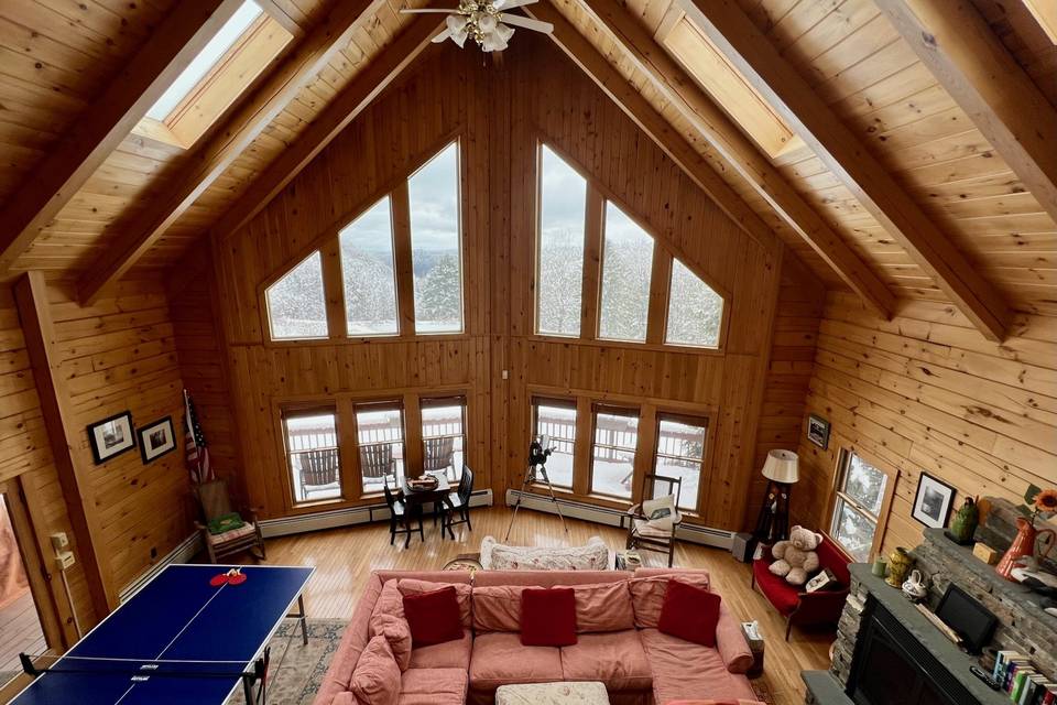 Log home living room fireplace
