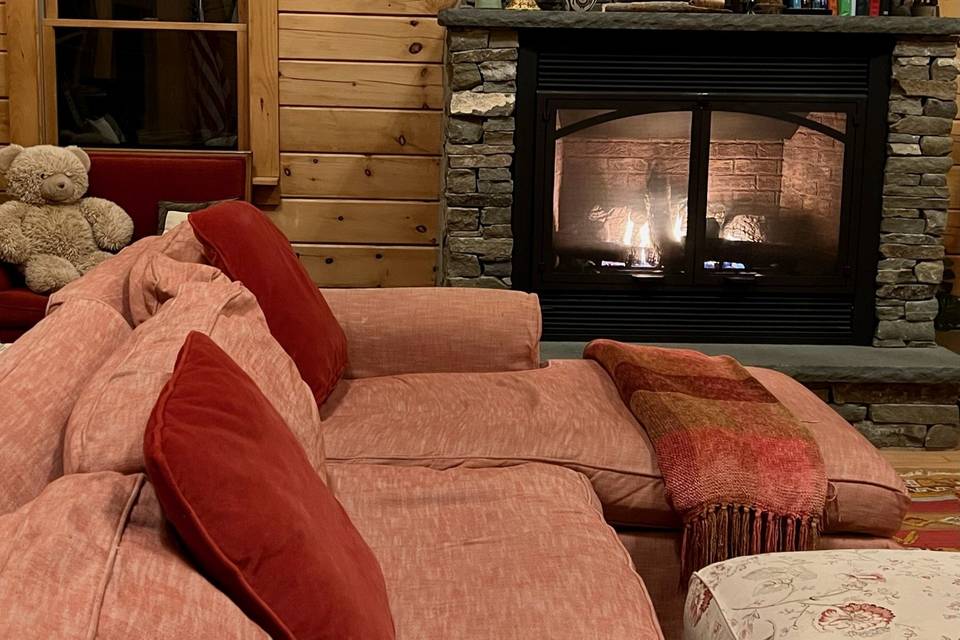 Log home living room fireplace