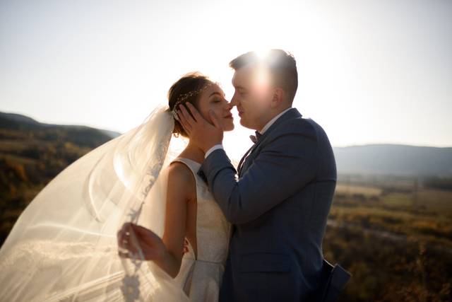 vecteezy_portrait-of-a-young-beautiful-bride-and-her-husband-in-the_6919318.jpg