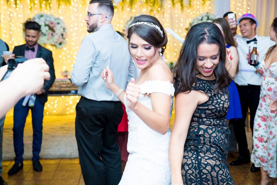 Bride dancing with guests