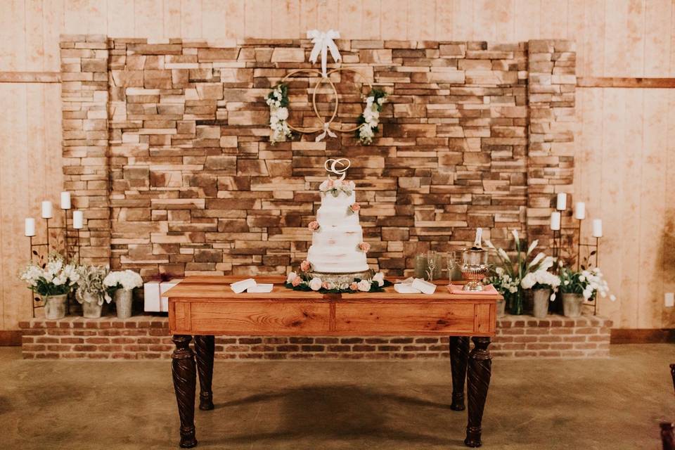 Stone wall with cake table