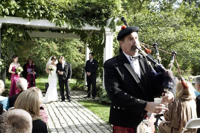 I provided all the ceremony music for this outdoor wedding. Leading the newlyweds to their reception.