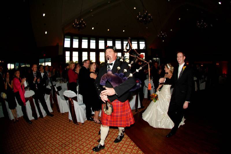 Leading in the newlyweds into the reception. I was a surprise for their guests. I brought two highland dancers with me and did a short program.