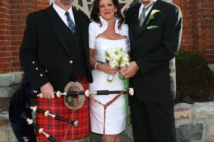 Pose after the ceremony in front of the church.