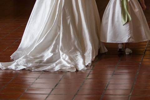 Unposed shot of bride and flower girl