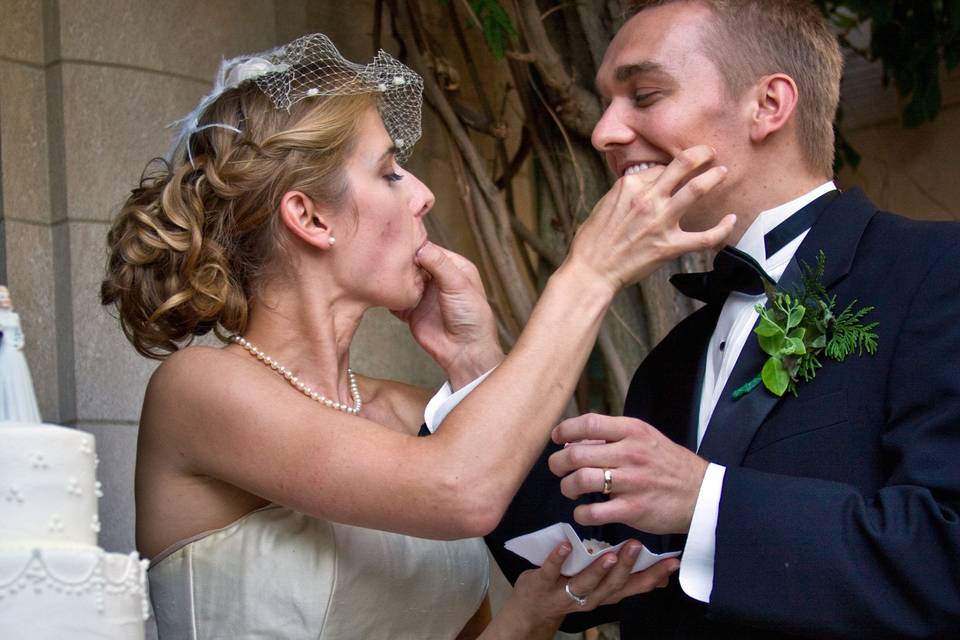 Bride and groom and wedding cake