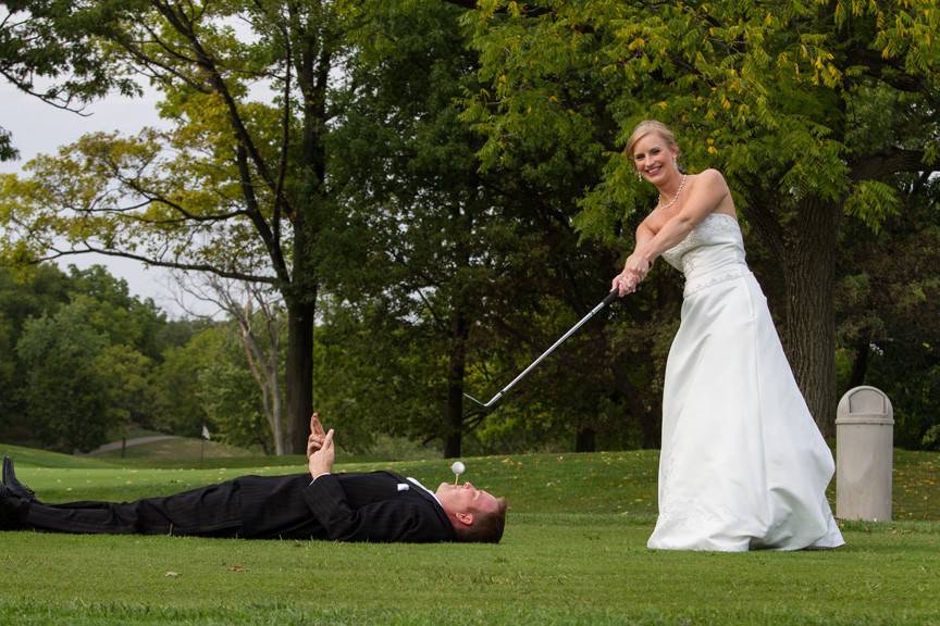 Bride and groom tee off in fun photo at country club wedding