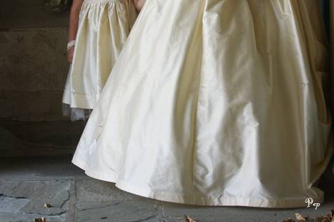Unposed photo of bride and flower girl