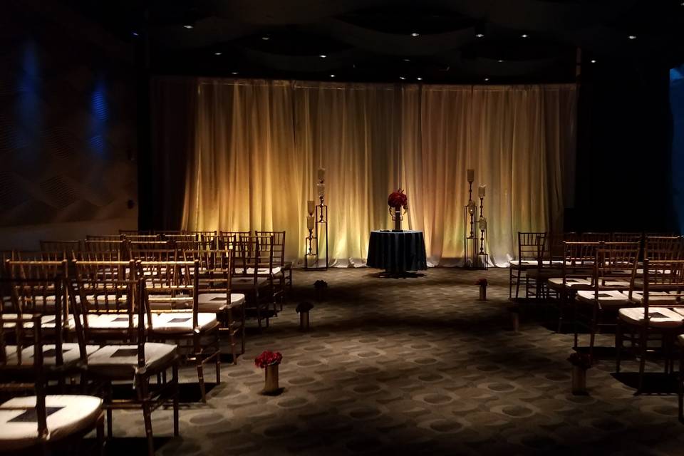 Golden Uplights on White Drape