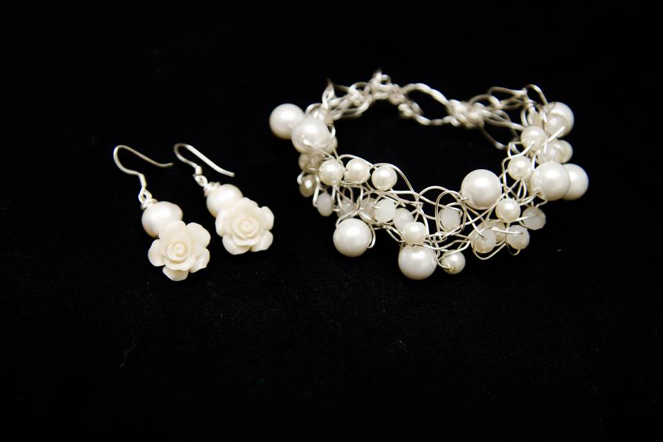 Bracelet/Earring Set designed and created by Mystic Angel Creations. Materials used: artisan grade, nontarnishable wire, glass pearls, crystals and coral flowers