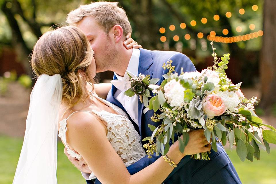 Newlyweds kissing