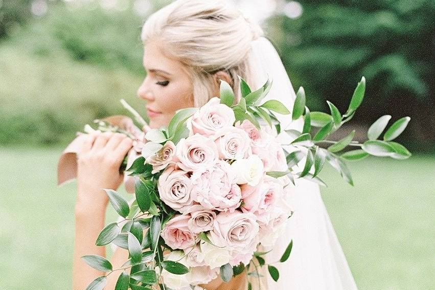 A beautiful bride with her beautiful bouquet