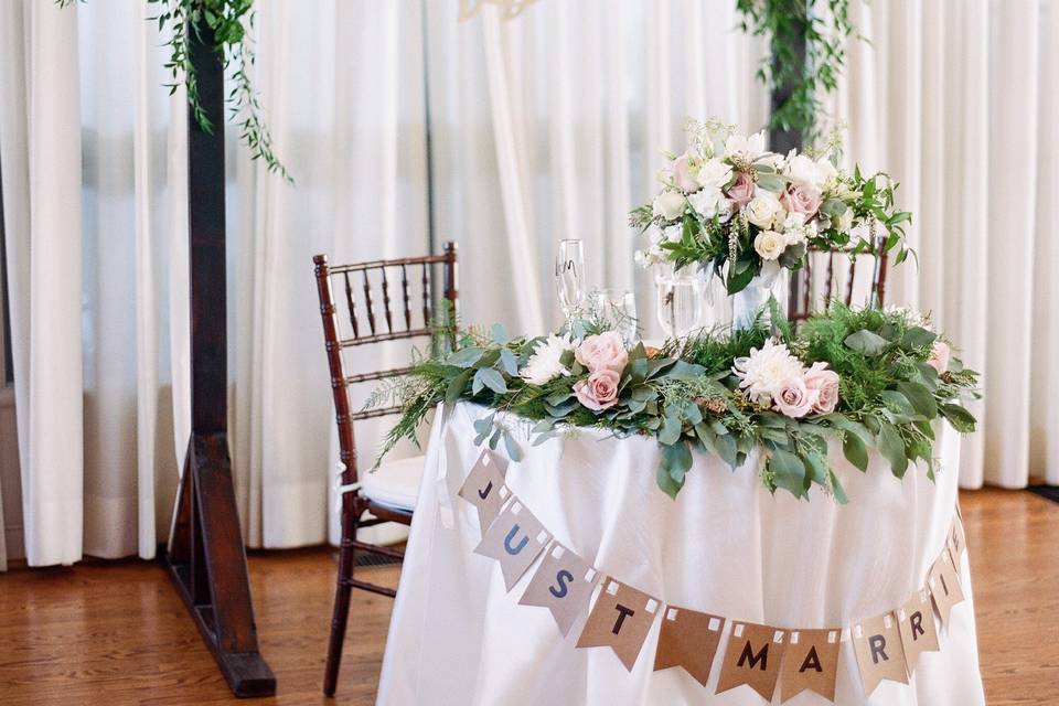 Sweetheart table with backdrop