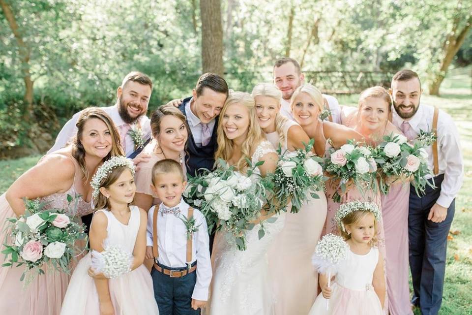 Bridal party with flowers