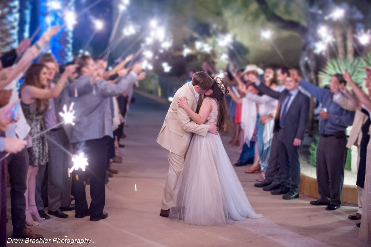 Wedding Glow Stick Send Off with a Wood Backdrop Stock Photo