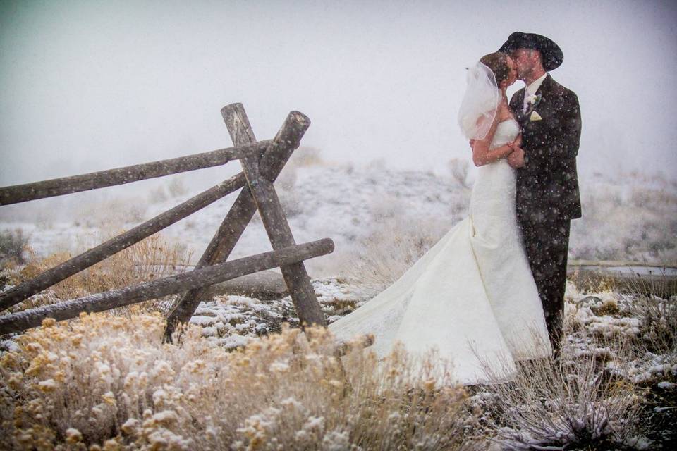 Couple kiss in the snow