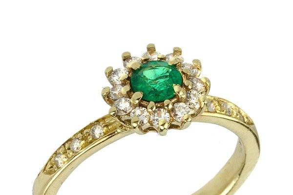 Diamond engagement ring with rubies and emeralds