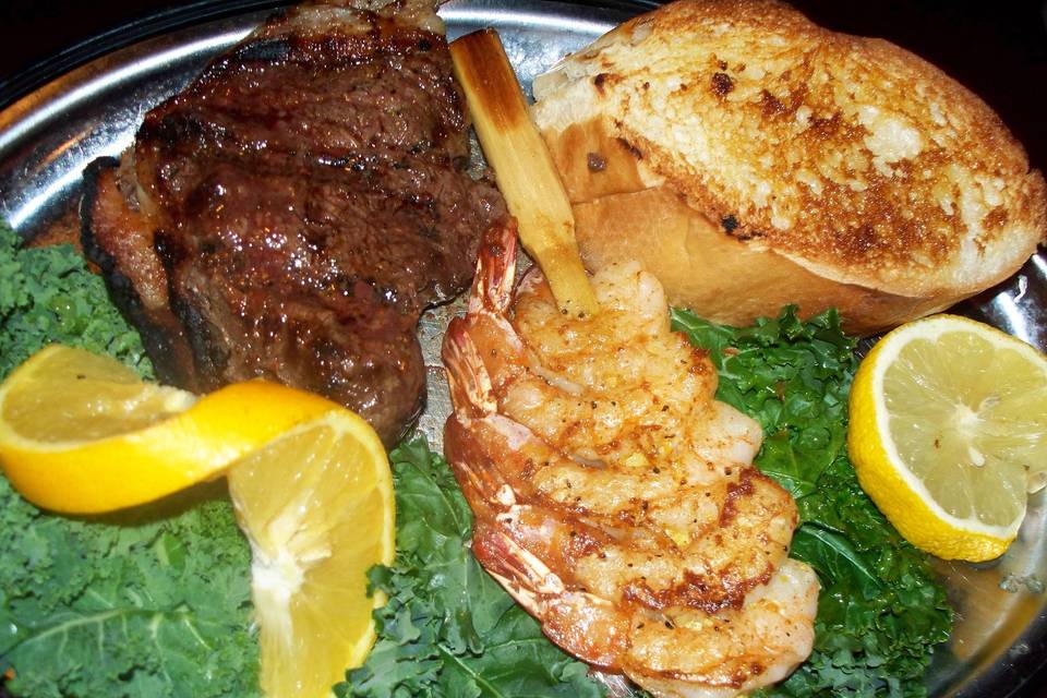 Grilled steak and shrimp skewer